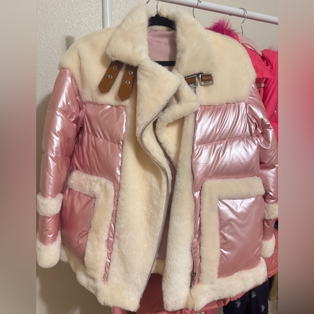 Pink and cream-colored women's down jacket